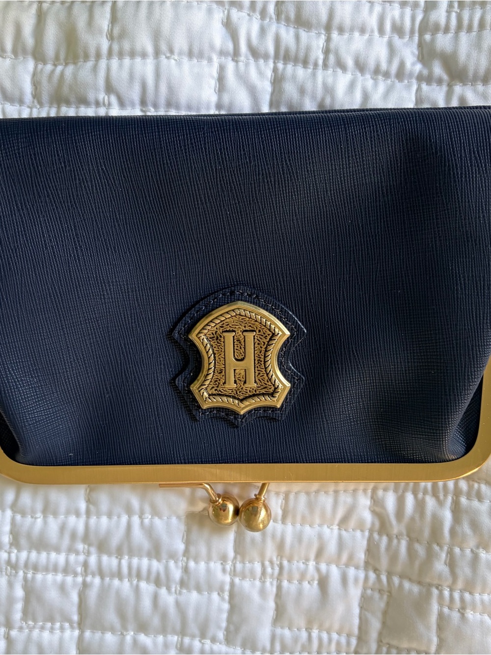 Elegant Navy Clutch with Gold Crest Accent